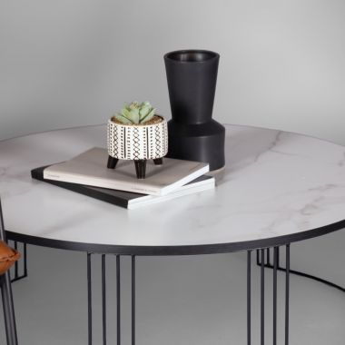 modern coffee table with marble top and accessories