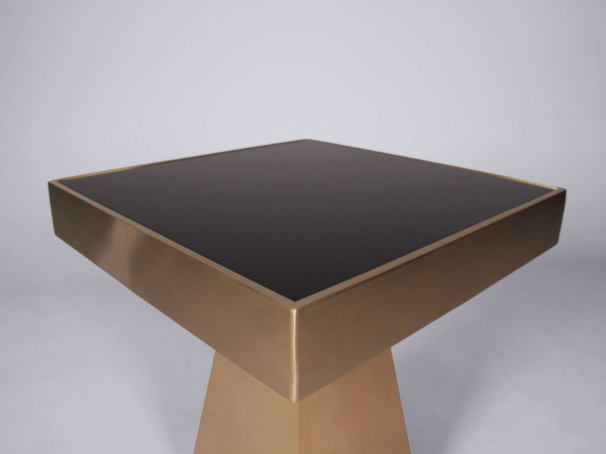 geometric gold and black side table