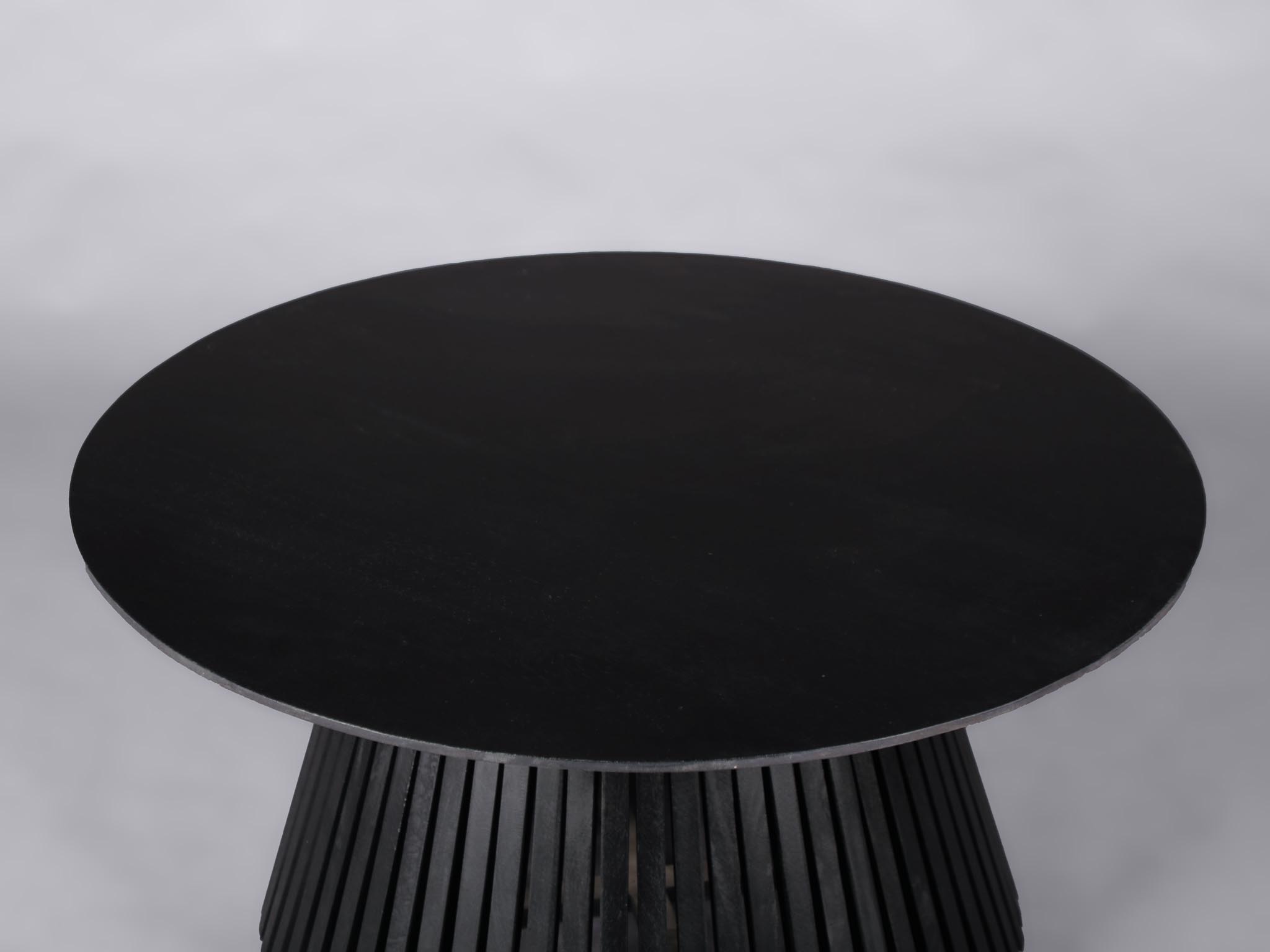 black wooden round coffee table
