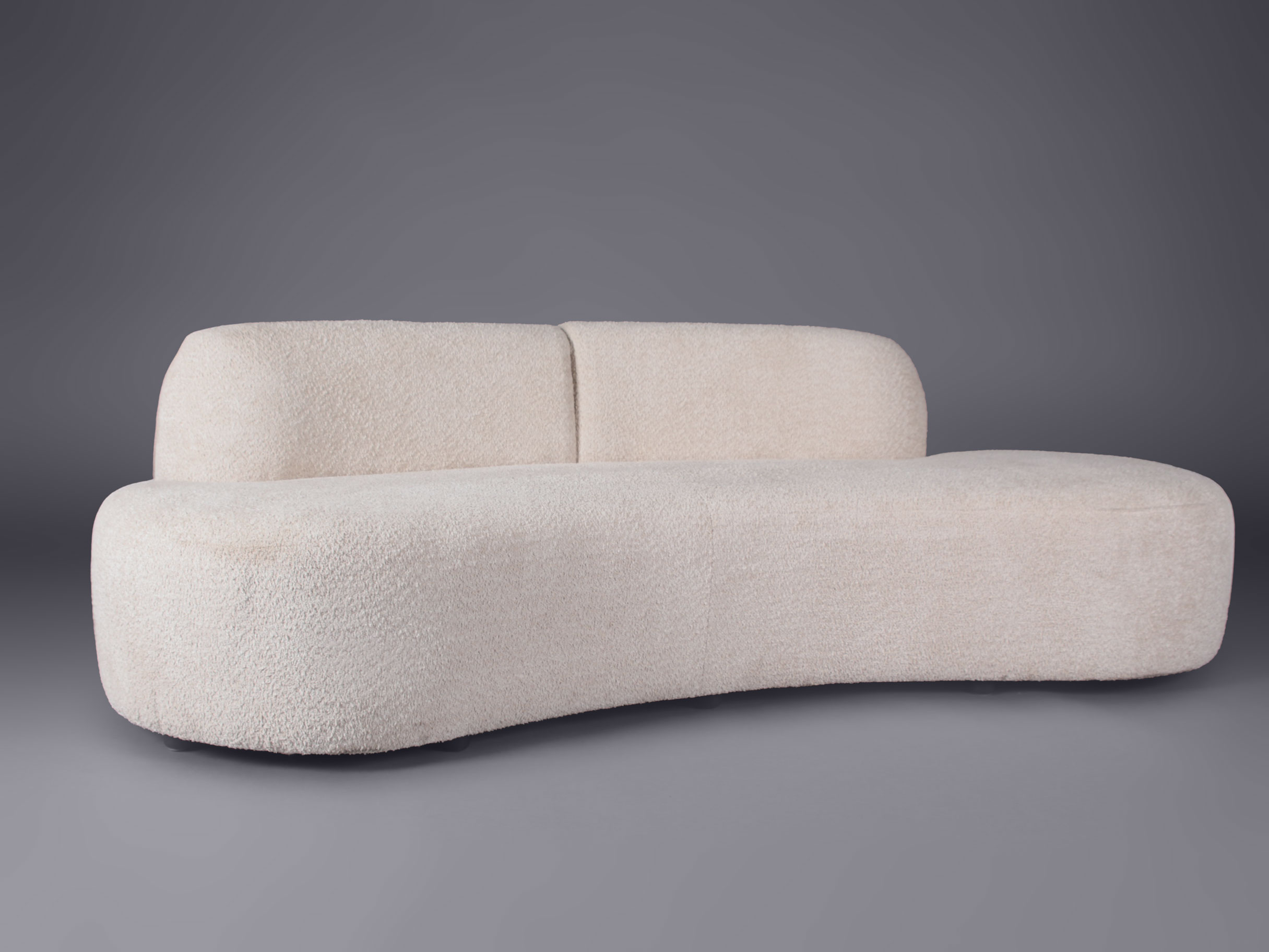bouclé curved sofa