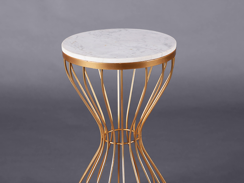 hourglass side table with gold frame and marble top