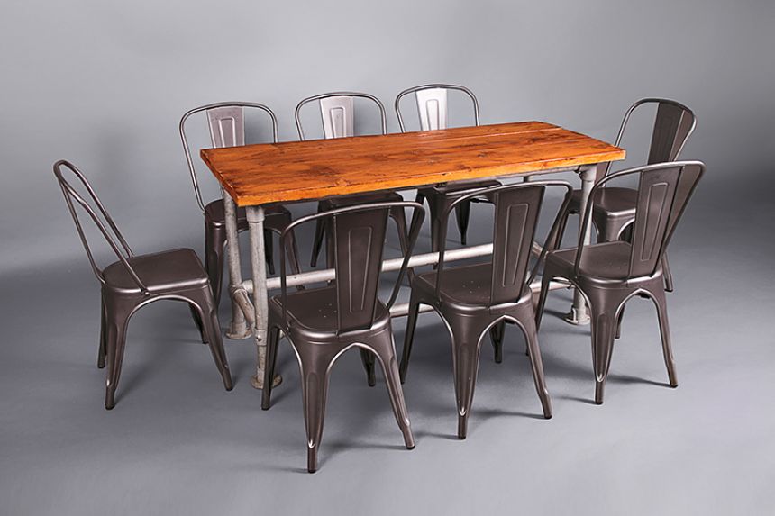Furniture on the move pipe and wood high table with industrial style chairs