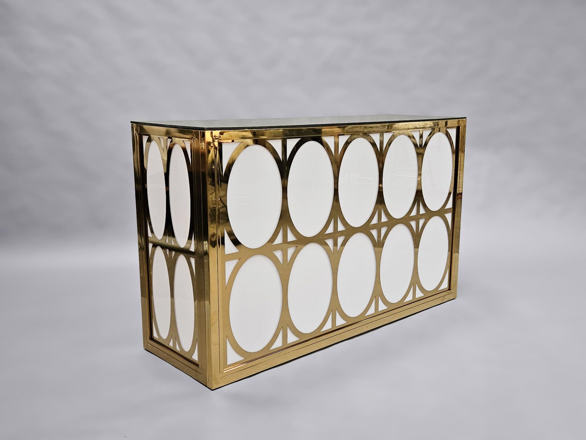 Furniture On The Move - white bar hire with gold detail in circular patterns