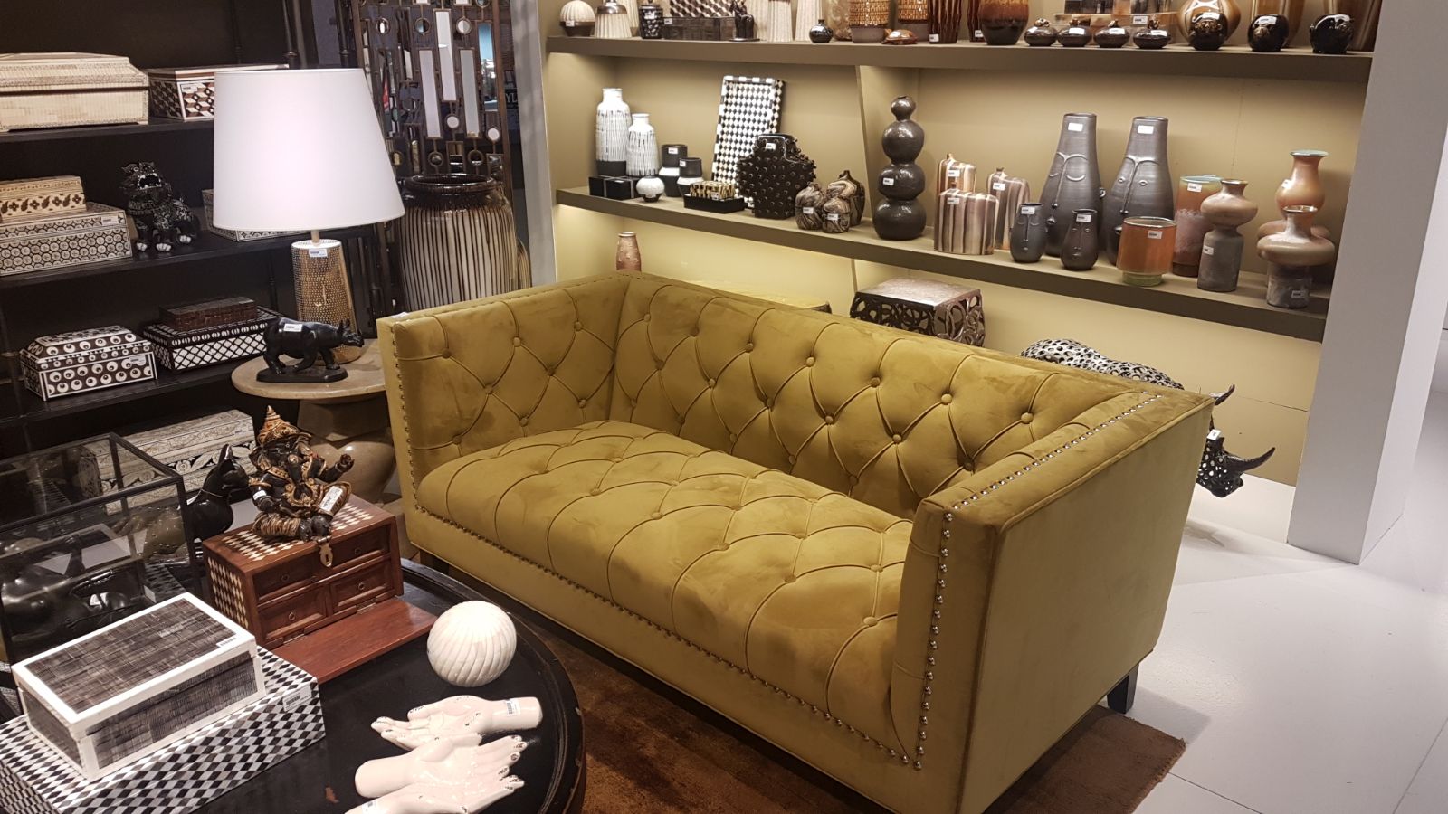 Image of mustard colour velvet Chesterfield sofa