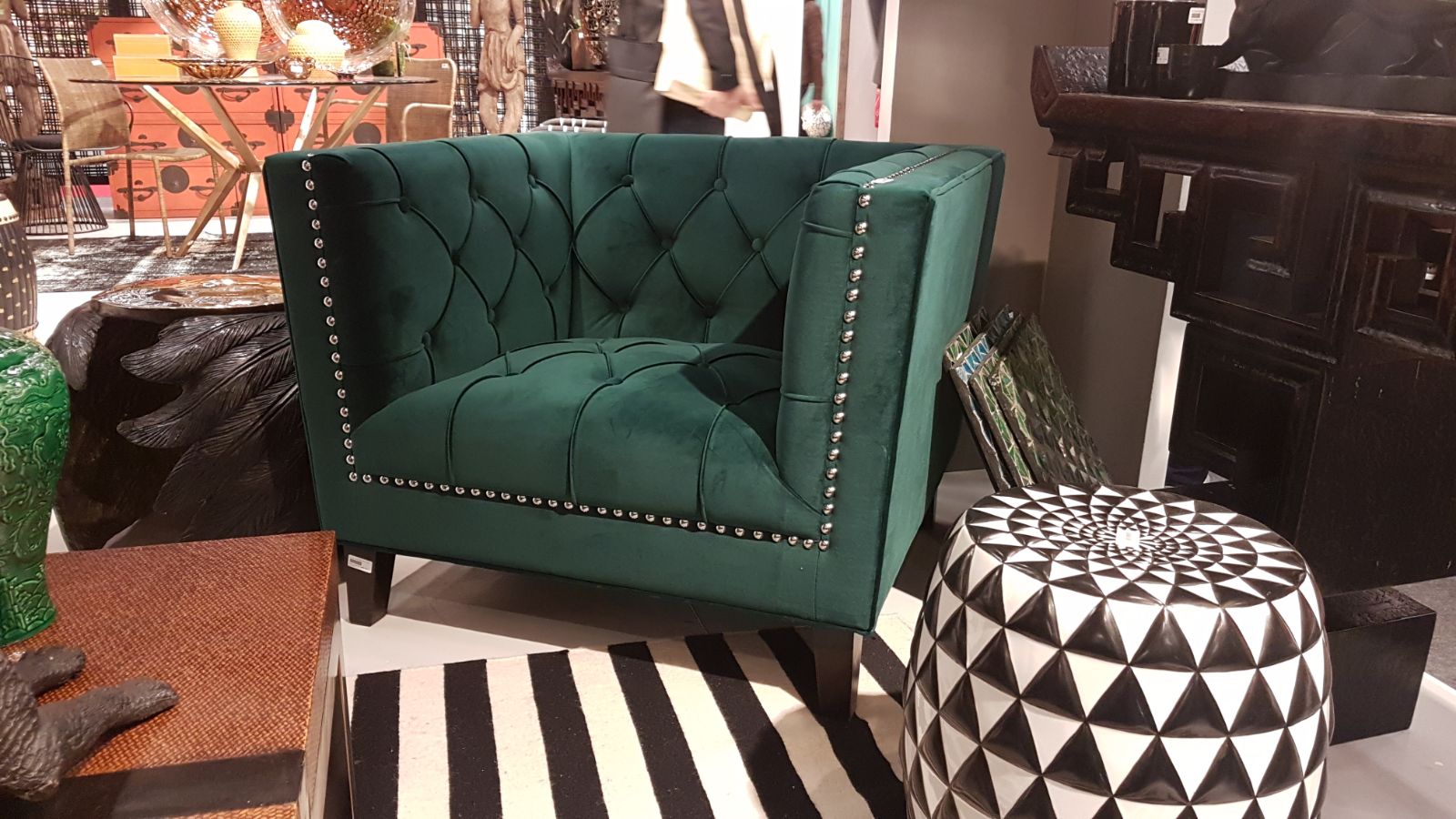 image of dark green velvet chesterfield armchair