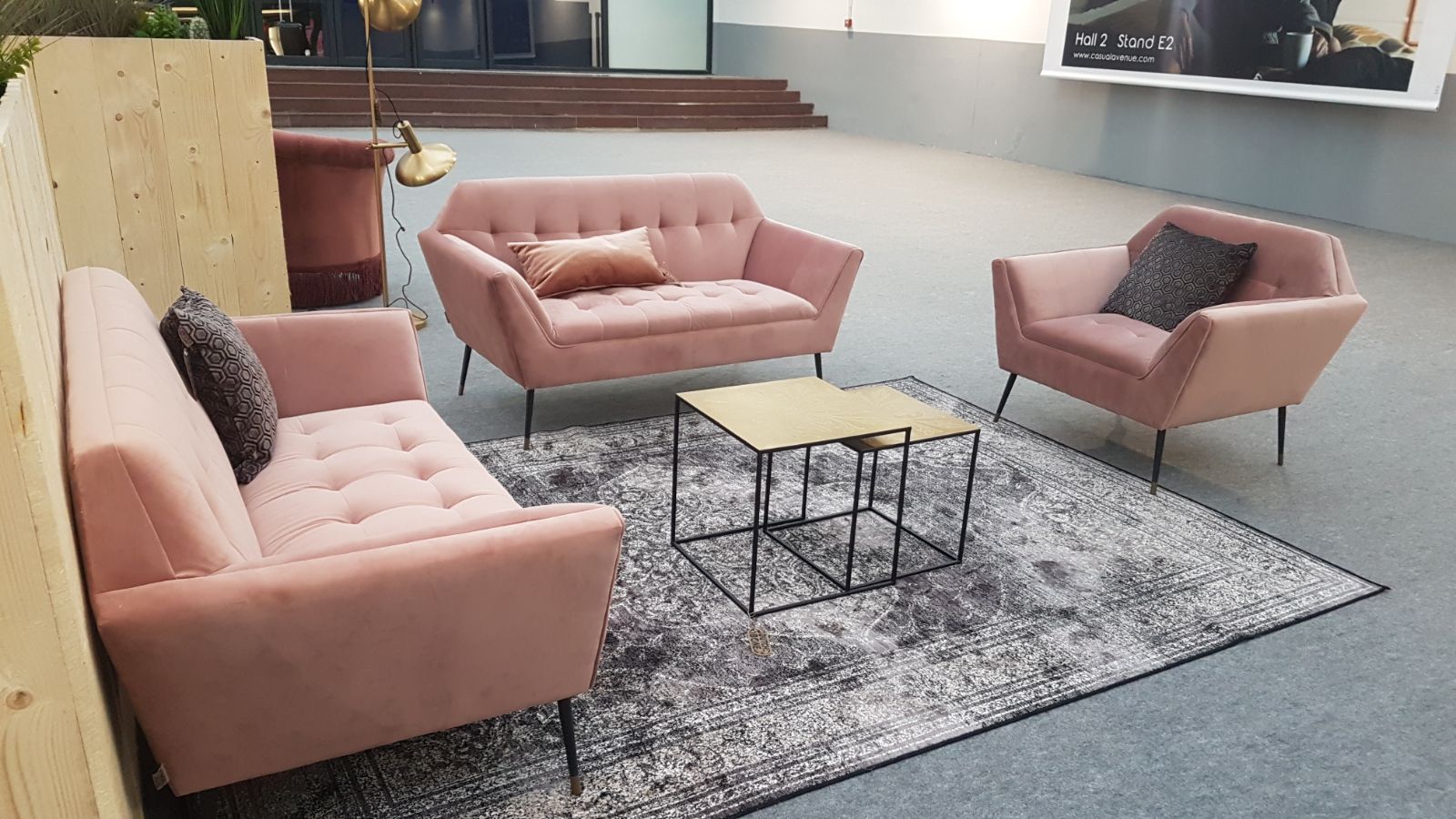 image of pastel pink hired furniture laid out in a circle