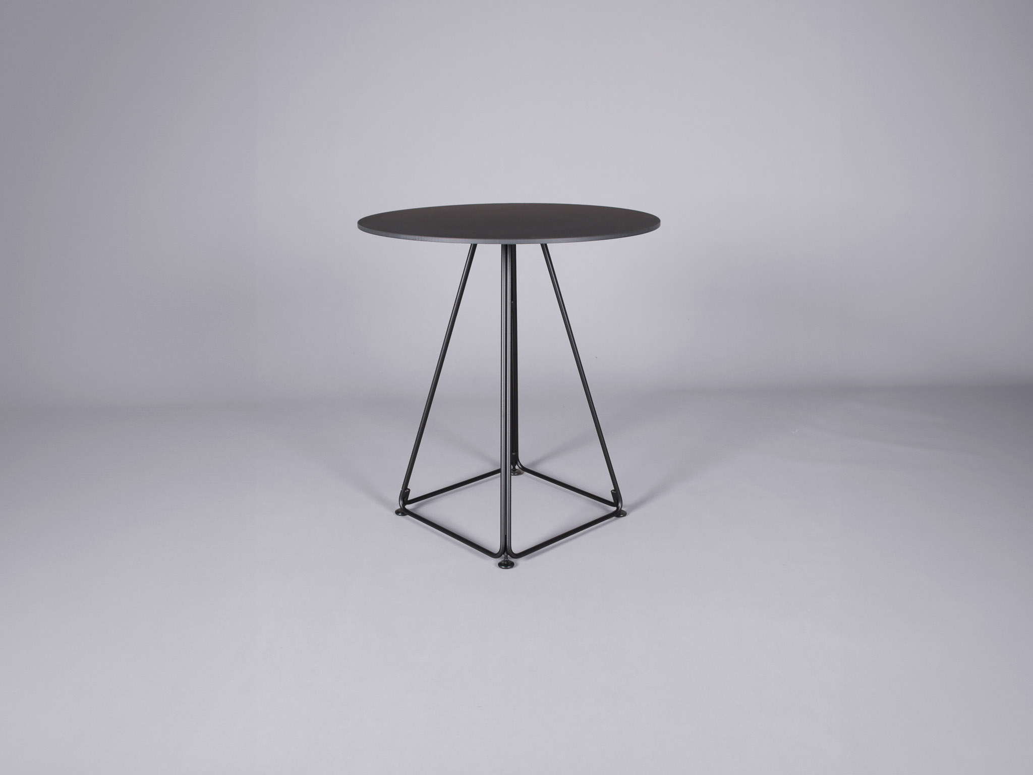 This bistro table pairs effortlessly with an industrial chair for an urban look or with a velvet dining chair for a more upscale feel.