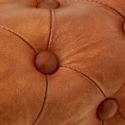 Close up texture image from a leather footstall called Texas