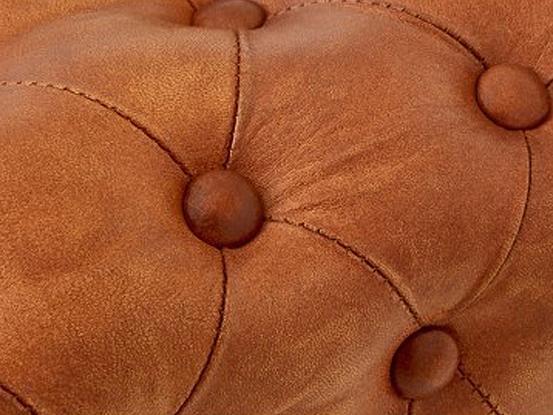 Close up texture image from a leather footstall called Texas