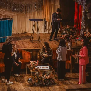 Stylish orange 2 and 3 seater sofas for a wedding event in London